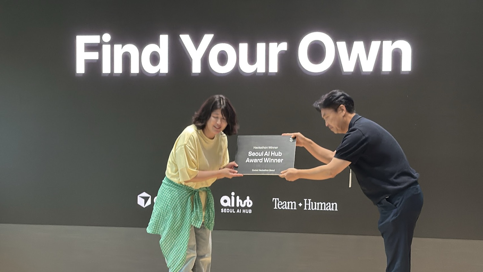 Seoul AI Hub Award winner on stage