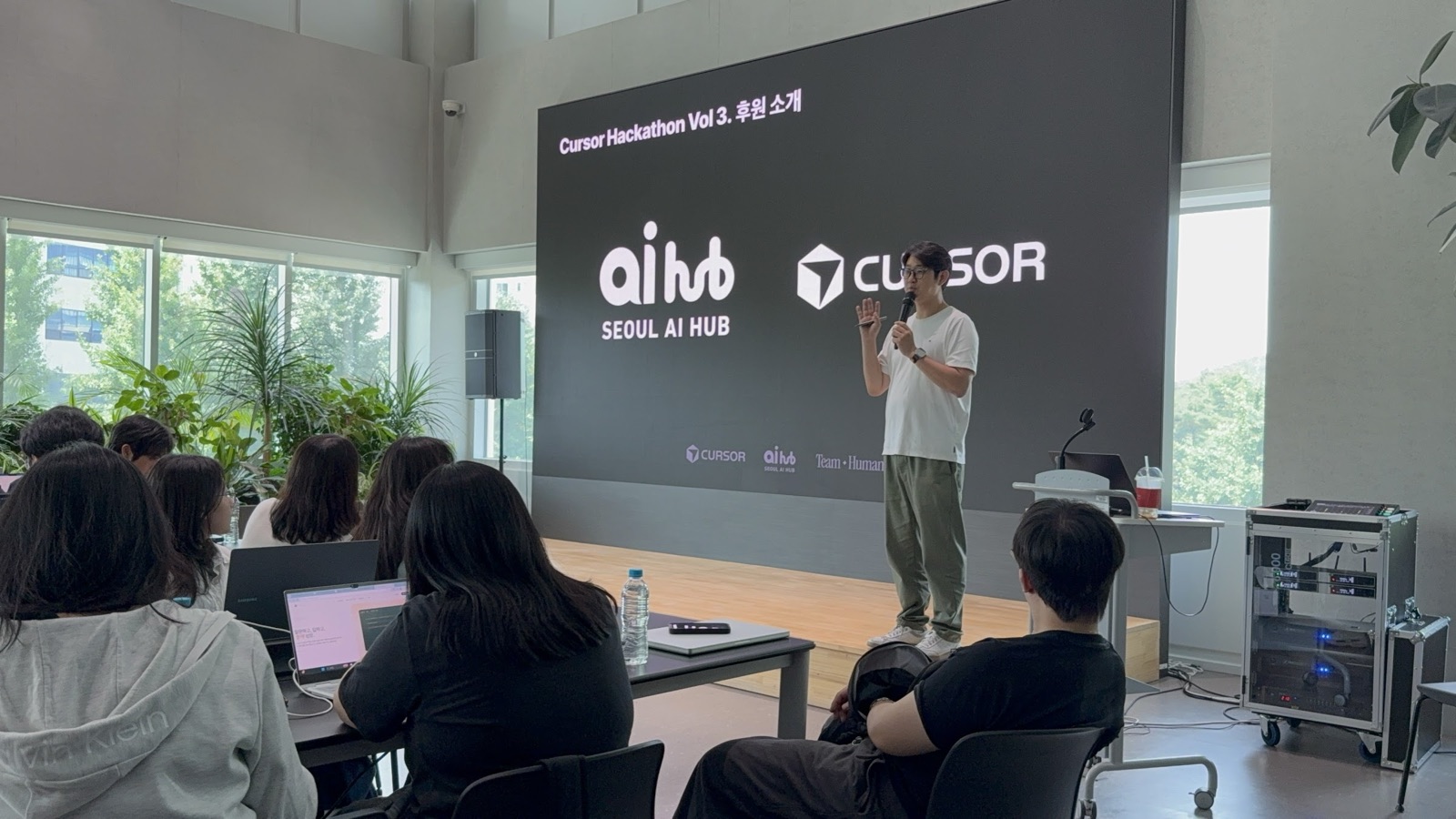 Stage with Seoul AI Hub and Cursor logos